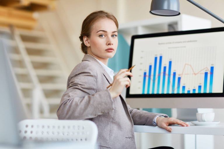 Business analyst reviewing research