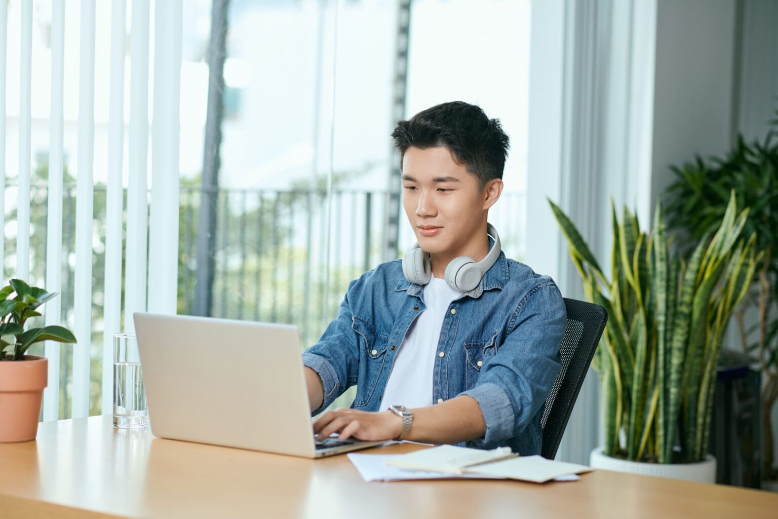 Learner working with a laptop