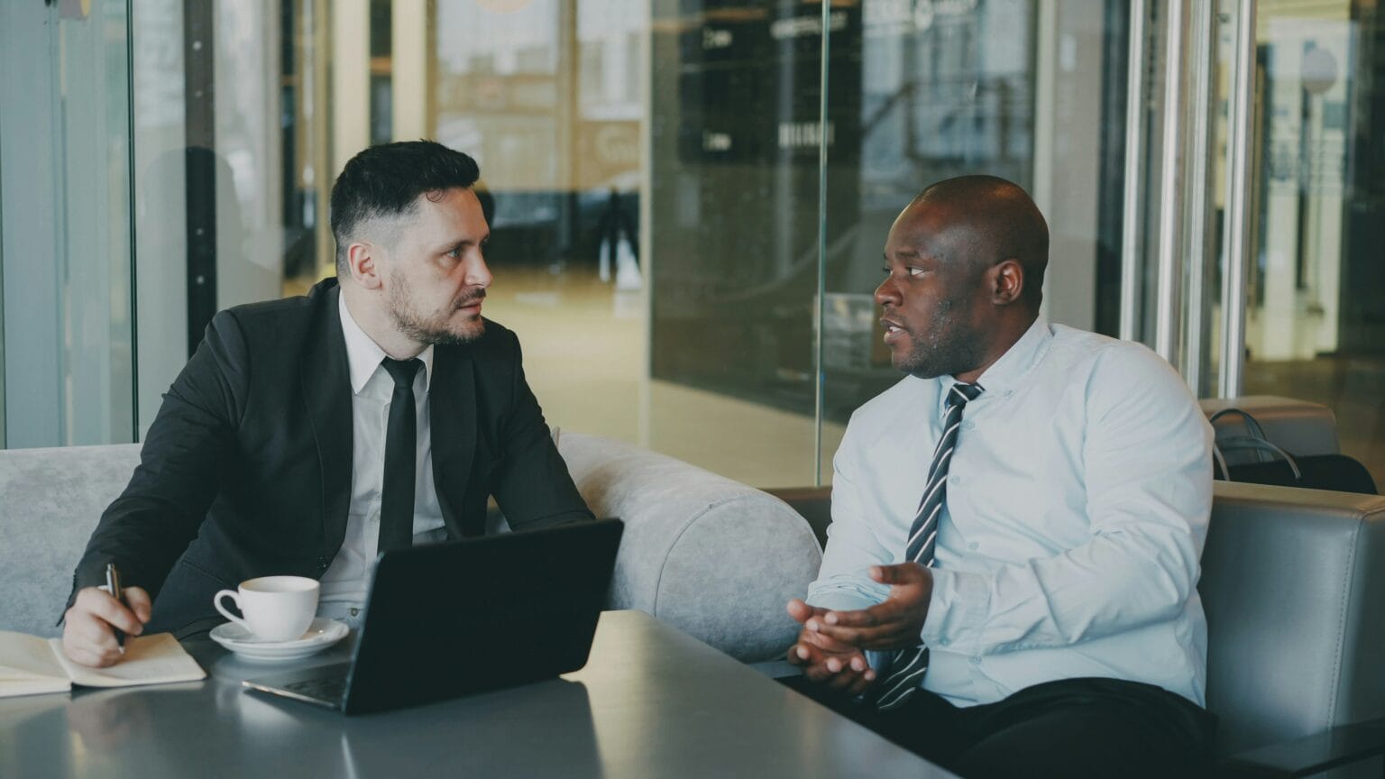 Professionals in a mentoring conversation